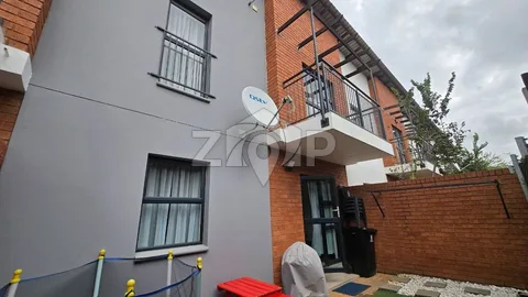 Fully enclosed garden with instant lawn
